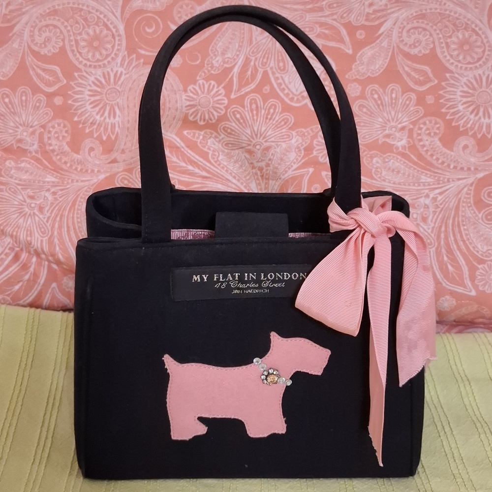 My flat in London, Jan Haedrich, Black vintage bag with pink scotie dog.